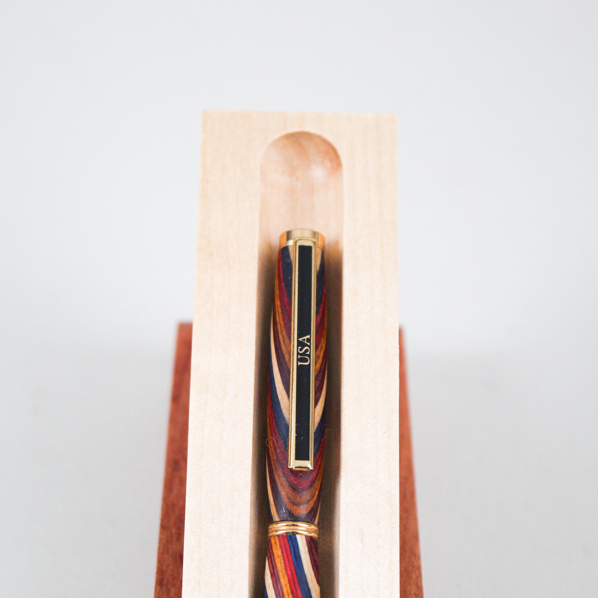 Laminated Lathe-Turned Gold USA Clip Pen with Standing Case