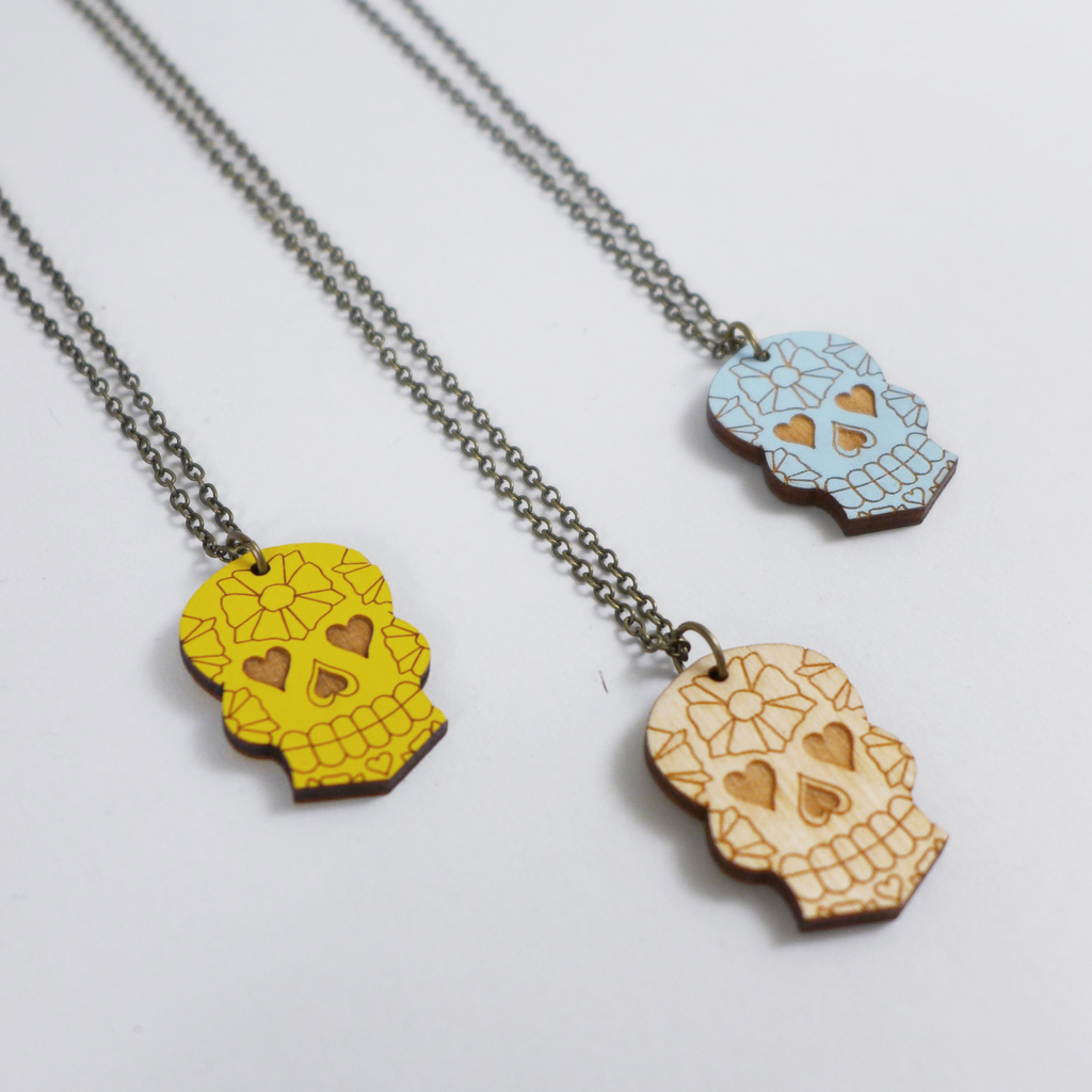 Fun, Colorful laser cut wood Skull necklace by Unpossible Cuts at the Center for Art in Wood